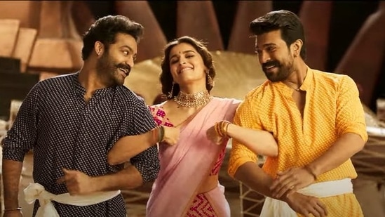 Alia Bhatt, Ram Charan and Jr NTR in a still from RRR's new song Sholay.