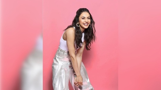 Rakul Preet added some colour to her look and opted for a pair of vibrant orange pumps.(Instagram/@rakulpreet)