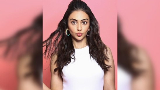 Rakul Preet's outfit comprises a white body-hugging sleeveless top and metallic silver cropped dhoti inspired high-rise trousers.(Instagram/@rakulpreet)