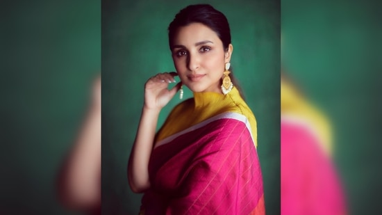 Parineeti Chopra ditched Western wears for this timeless pink and yellow nine-yards.(Instagram/@patineetichopra)