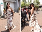 Nora Fatehi and bodycon dresses' love affair is a treat to the eyes. The actor loves body-hugging outfits that accentuate her beautiful curves. In her recent photos clicked by the paparazzi, the Moroccan beauty can be seen welcoming spring in a mesmerising off-white floral strapless bodycon dress with an attached train.(HT Photo/Varinder Chawla)