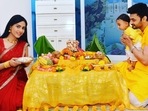 Amrita Rao with husband RJ Anmol and son Veer during a puja. Amrita Rao with husband RJ Anmol and son Veer during a puja.