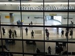 FILE - People in the arrivals area at Heathrow Airport in London, Jan. 26, 2021, during England's coronavirus lockdown. (File photo) (AP) FILE - People in the arrivals area at Heathrow Airport in London, Jan. 26, 2021, during England's coronavirus lockdown. (File photo) (AP)