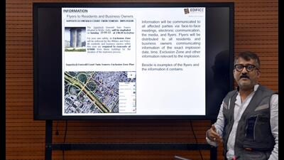 Uttkarsh Mehta, partner at Edifice Engineering, explains the demolition process to the media, at the Noida authority’s office on Monday. (Sunil Ghosh /HT)