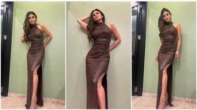 The ever so stylish Mouni Roy once again left her Instagram family awestruck with her latest pictures in a shimmery slit body-hugging dress. (Instagram/@imouniroy) The ever so stylish Mouni Roy once again left her Instagram family awestruck with her latest pictures in a shimmery slit body-hugging dress. (Instagram/@imouniroy)