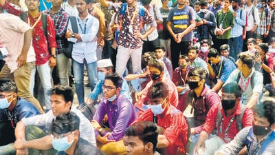 Students stage a sit-in protest against the Karnataka High Court verdict to upheld the hijab ban in schools and colleges, saying that wearing the hijab is not essential to Islam, in Chennai on Tuesday. (ANI)