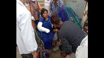 A patient being shifted after fire in New Surgery Building of SN Medical College and Hospital of Agra . (HT photo)