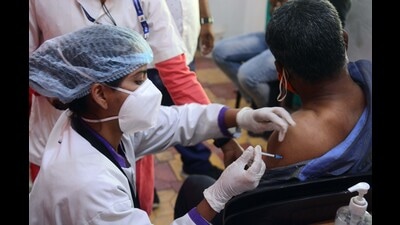 A beneficiary gets vaccinated at Annabhau Sathe Kalamandir, Yerawada. (Shankar Narayan/HT PHOTO) A beneficiary gets vaccinated at Annabhau Sathe Kalamandir, Yerawada. (Shankar Narayan/HT PHOTO)
