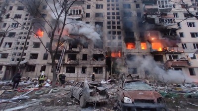 Firemen work to extinguish a fire in an apartment building hit by shelling in the Obolon district of Kyiv, Ukraine. (AFP PHOTO / State Emergency Service of Ukraine / handout) Firemen work to extinguish a fire in an apartment building hit by shelling in the Obolon district of Kyiv, Ukraine. (AFP PHOTO / State Emergency Service of Ukraine / handout)