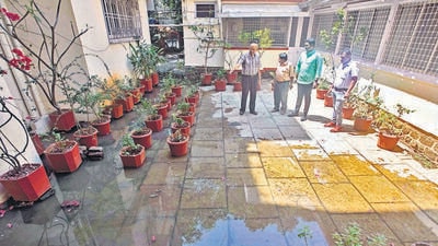 The Damles – who gave Pune city Prabhat Cinema – have been living in misery because of seeping drainage water ever since the 24x7 water project began on Law college road. (PRATHAM GOKHALE/HT)