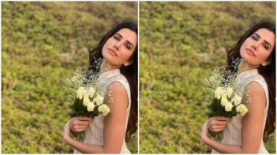 Styled by fashion stylist Divish Sharma, Sonnalli wore her tresses open in wavy curls with a middle part. (Instagram/@sonnalliseygall)