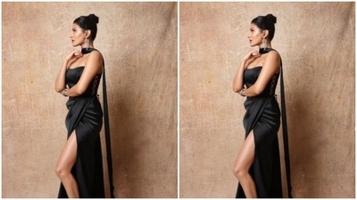 Assisted by makeup artist Nidhi Agarwal, Amyra decked up in nude eyeshadow, black eyeliner, mascara-laden eyelashes, drawn eyebrows, contoured cheeks and a shade of sofdt maroon lipstick. (Instagram/@amyradastur93)
