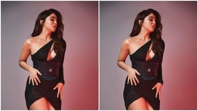 Sharvari’s one shoulder outfit came with full sleeve and a midriff-baring detail. It came adorned with a leather detail at the waist decorated with a gold button. (Instagram/@sharvari)