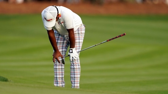Anirban Lahiri reacts after missing a shot on the 18th hole during the final round of play in The Players Championship(AP)