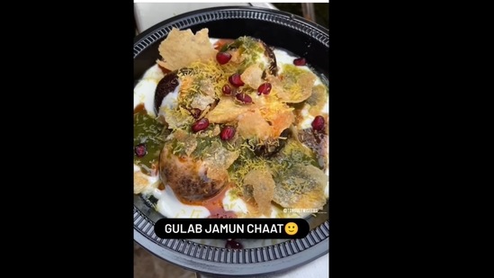 A screengrab of the video posted by a food blogger in which a street vendor prepares gulab jamun chaat.&nbsp; (tonguetwisters___/Instagram)