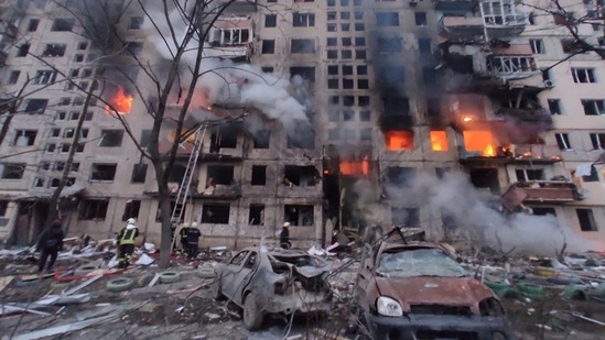 Firemen work to extinguish a fire in an apartment building hit by shelling in the Obolon district of Kyiv, Ukraine.(AFP PHOTO / State Emergency Service of Ukraine / handout)