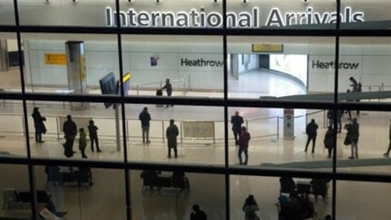 FILE - People in the arrivals area at Heathrow Airport in London, Jan. 26, 2021, during England's coronavirus lockdown. (File photo) (AP) FILE - People in the arrivals area at Heathrow Airport in London, Jan. 26, 2021, during England's coronavirus lockdown. (File photo) (AP)