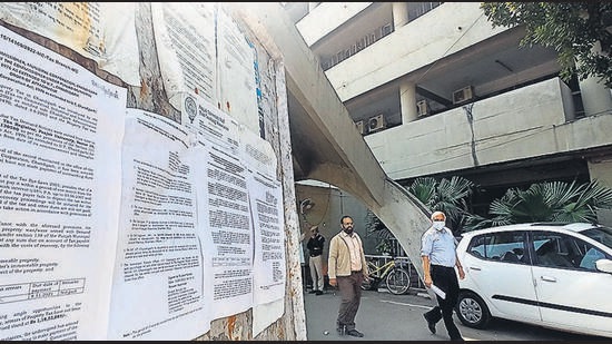 An order on pending property tax put up outside the administrative block at Panjab University. (Ravi Kumar/HT)