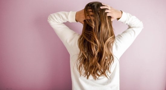 Apply a leave-in conditioner to soften your hair. 