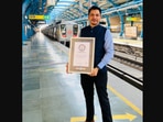 The image shows Prafull Singh, the Delhi Metro employee who travelled to 254 stations covering 348 kms.