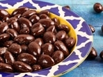 Chocolate-coated almonds help satiate your taste buds and are also healthy.