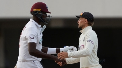 West Indies' Jason Holder shakes hands with England's Joe Root after a draw. (Action Images via Reuters)
