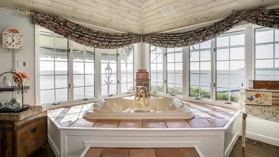 The image shows another bathroom of the Michigan house listed at $979,000 that also features a throne-like toilet. (Screengrab)