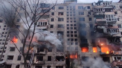 Firemen work to extinguish a fire in an apartment building hit by shelling in the Obolon district of Kyiv, Ukraine. Firemen work to extinguish a fire in an apartment building hit by shelling in the Obolon district of Kyiv, Ukraine.