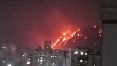 Two fire tenders and a water tanker rushed to the Khargar hill after a massive fire broke out here, police said.