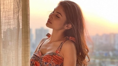 Mouni Roy soaks up the sun in floral midi dress for dreamy golden hour shoot in balcony: See pics Mouni Roy soaks up the sun in floral midi dress for dreamy golden hour shoot in balcony: See pics