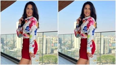 Sunny paired a multicoloured full-sleeved shirt with a bright red pencil skirt. (Instagram/@sunnyleone)