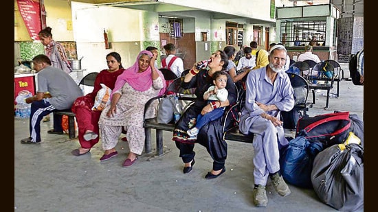 With at least 50 buses of the Punjab Roadways and Pepsu Road Transport Corporation (PRTC) deployed to ferry Aam Aadmi Party supporters to chief minister Bhagwant Mann’s swearing-in ceremony at Khatkar Kalan (Nawanshahr), commuters at the city bus stand were a harried lot. (Gurpreet Singh/HT)