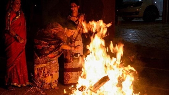 Here some cures that all zodiac signs can perform during Holika Dahan (Milind Saurkar/HT Photo)