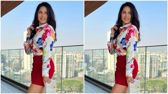 Sunny paired a multicoloured full-sleeved shirt with a bright red pencil skirt.(Instagram/@sunnyleone)