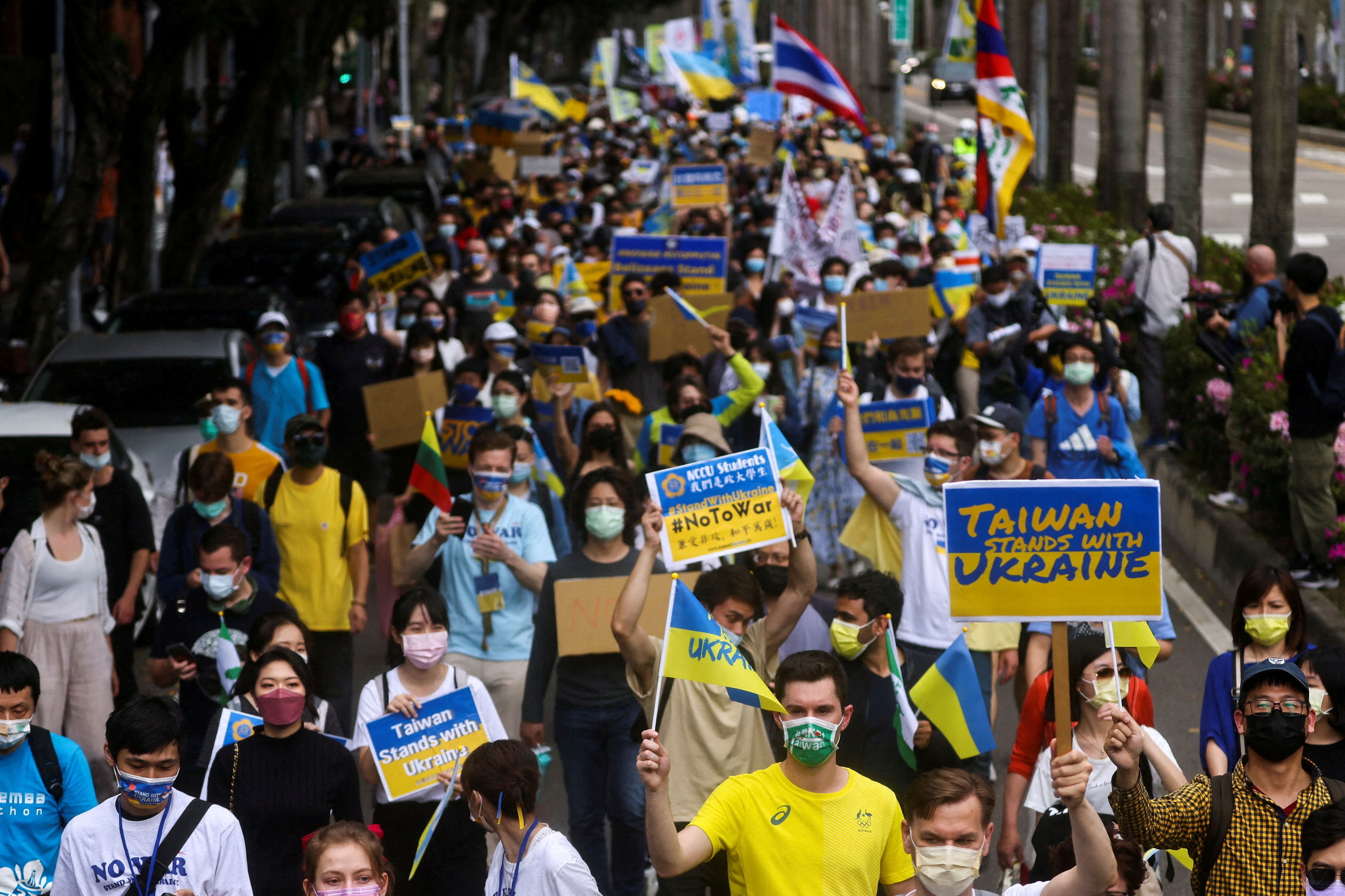 People attend a rally against Russia's invasion of Ukraine in Taipei, Taiwan, on March 13, 2022.&nbsp; (Reuters Photo)