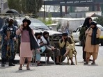 Members of the Taliban man a road checkpoint in Kandahar. Members of the Taliban man a road checkpoint in Kandahar.