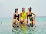 Kareena Kapoor, Karisma Kapoor, and Natasha Poonawalla during their Maldives vacation. Kareena Kapoor, Karisma Kapoor, and Natasha Poonawalla during their Maldives vacation.