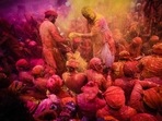 Holi is one Indian festival that is celebrated with great grandeur and enthusiasm by all religions across the country. Most people celebrate the festival by applying vibrant colours on one another and play with water but that's not it. There are various unique ways of celebrating it in different states.(Unsplash)