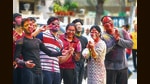 Some societies are restricting celebrations to just dry colours, whereas some are allowing entry to only fully vaccinated residents with masks at the venue, after temperature check at the entry. (Photo: Amal KS/HT) Some societies are restricting celebrations to just dry colours, whereas some are allowing entry to only fully vaccinated residents with masks at the venue, after temperature check at the entry. (Photo: Amal KS/HT)