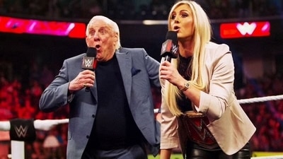 File photo of Charlotte Flair and her father Ric Flair (WWE) File photo of Charlotte Flair and her father Ric Flair (WWE)