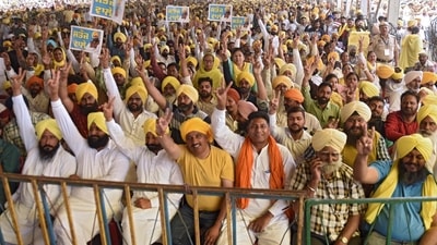 Supporters shout slogans during the swearing-in ceremony of Bhagwant Mann of the Aam Aadmi Party (AAP) as the 17th chief minister of Punjab in Khatkar Kalan village. (AFP) Supporters shout slogans during the swearing-in ceremony of Bhagwant Mann of the Aam Aadmi Party (AAP) as the 17th chief minister of Punjab in Khatkar Kalan village. (AFP)