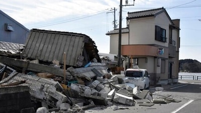 Debris from a destroyed building is seen following an earthquake in Soma, Fukushima prefecture, northern Japan. (Kyodo News via AP)