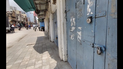 Closed shops in Muslim dominated Shivajinagar area during Karnataka 'bandh' called by Ameer E Shariyat after Karnataka high court's order on hijab ban, in Bengaluru, Thursday. (PTI) Closed shops in Muslim dominated Shivajinagar area during Karnataka 'bandh' called by Ameer E Shariyat after Karnataka high court's order on hijab ban, in Bengaluru, Thursday. (PTI)