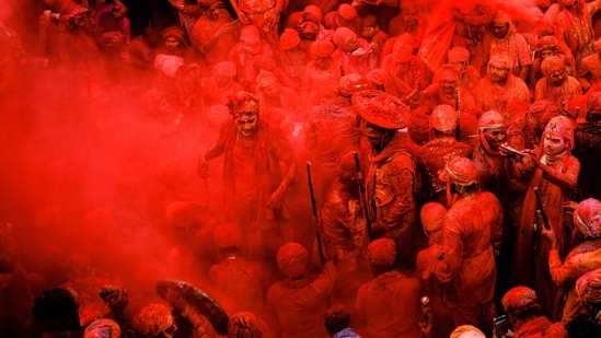 Uttar Pradesh - Lathmar Holi: As the name suggests, in Barsana, Mathura and Vrindavan, women playfully hit men with laathis. Men defend themselves with dhal or shield.(Unsplash)