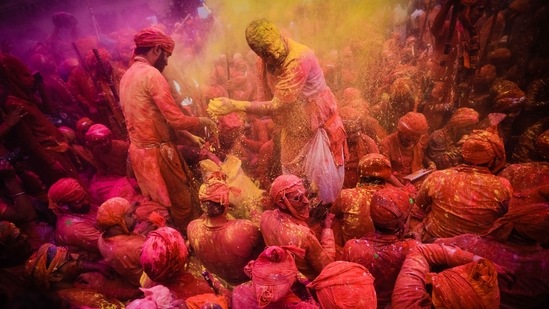 Holi is one Indian festival that is celebrated with great grandeur and enthusiasm by all religions across the country. Most people celebrate the festival by applying vibrant colours on one another and play with water but that's not it. There are various unique ways of celebrating it in different states.(Unsplash)
