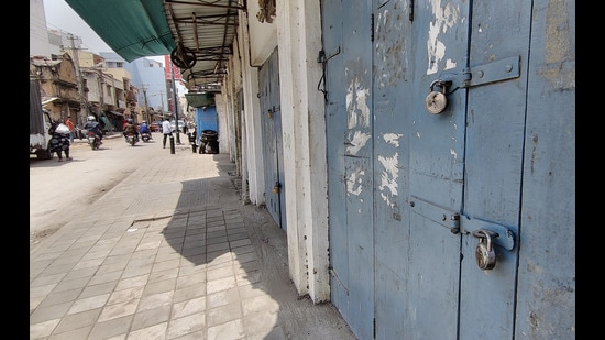 Closed shops in Muslim dominated Shivajinagar area during Karnataka 'bandh' called by Ameer E Shariyat after Karnataka high court's order on hijab ban, in Bengaluru, Thursday. (PTI)