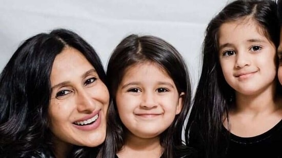 Teejay Sidhu with her daughters.