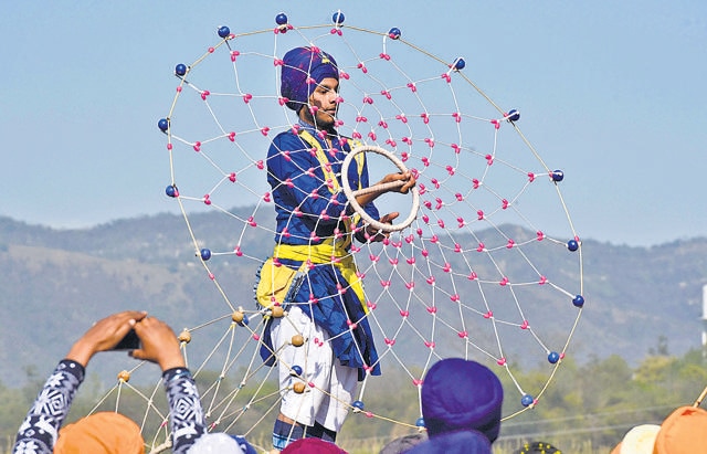 Nihangs performing Gatka skils during the Hola Mohalla festival at Anandpur Sahib. (Photo: Sanjeev Sharma/Hindustan Times) Nihangs performing Gatka skils during the Hola Mohalla festival at Anandpur Sahib. (Photo: Sanjeev Sharma/Hindustan Times)