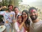 Katrina Kaif poses with husband Vicky Kaushal and his family.