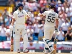 England's captain Joe Root and teammate Ben Stokes celebrate during day two of their second cricket Test match against West Indies at the Kensington Oval in Bridgetown. England's captain Joe Root and teammate Ben Stokes celebrate during day two of their second cricket Test match against West Indies at the Kensington Oval in Bridgetown.